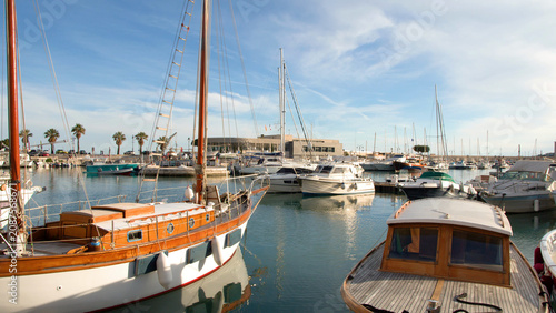 Canvastavla Traditional Wooden Sailboat and Modern Yachts in Sunny Cassis Harbor France