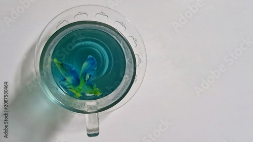 Принти на полотні herb tea of butterfly pea flower, empty space for caption