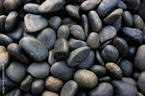 Photography Black pebbles on the garden, for decoration.
