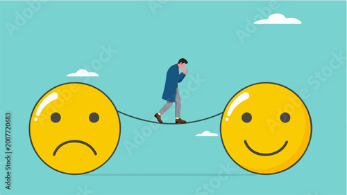 Photos Man walks a tightrope between sad and happy emojis