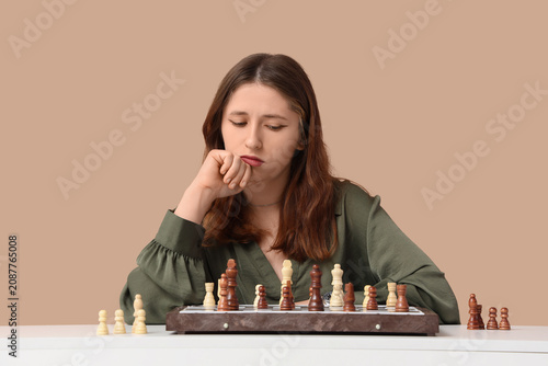 Young woman thinking while ...
