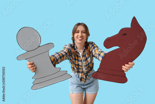 Young woman holding large c...