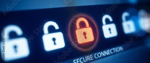 Secure connection padlock icons on screen with one glowing red with displaying multiple padlock close screen close up technology protection indicating interface