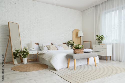 Bright modern bedroom with ...