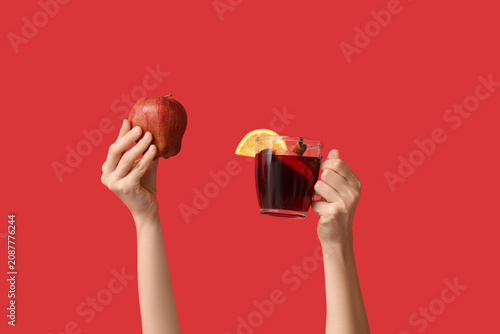 Female hands holding apple ...