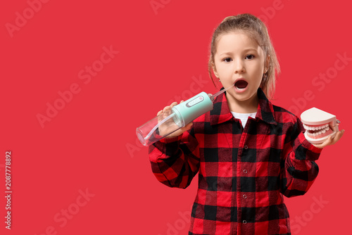 Cute little girl with oral ...