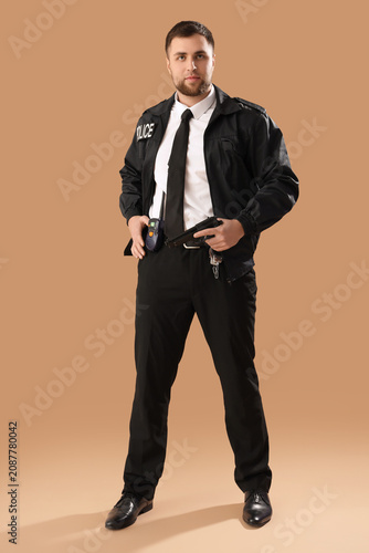 Male police officer with ra...