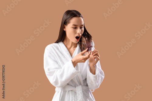 Shocked young woman with ha...