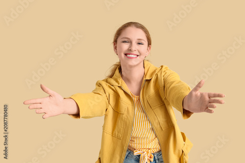 Smiling young redhead woman...