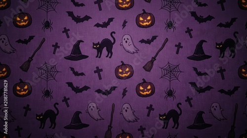 Halloween themed pattern with purple background and black and orange icons
