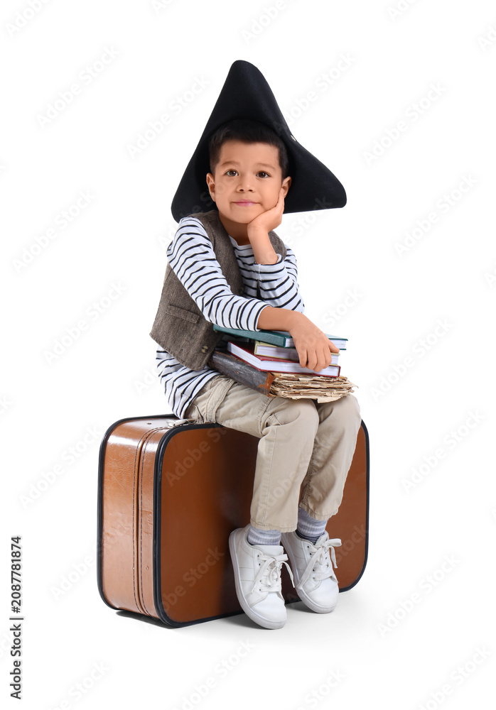 Obraz premium Cute little pirate with adventure book on white background