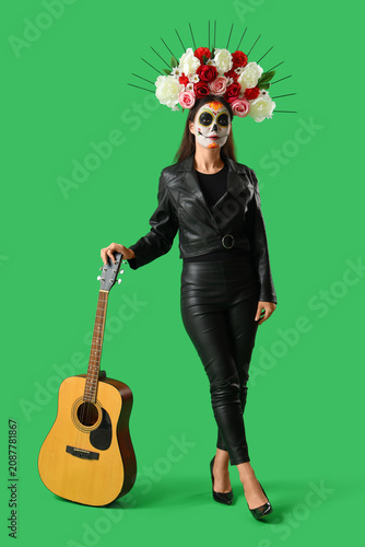 Young woman with painted sk...
