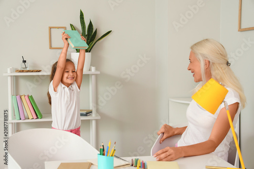 Little girl with her grandm...