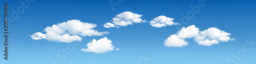 Foto White fluffy clouds in a clear blue sky with atmosphere floating atmospheric rel