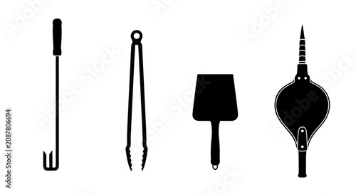 Foto Traditional fireplace tool set with bellows and poker.