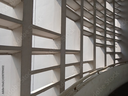 Foto Decorative breeze blocks in a white concrete wall as air vents.