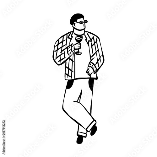 Man standing and holding a glass of wine 