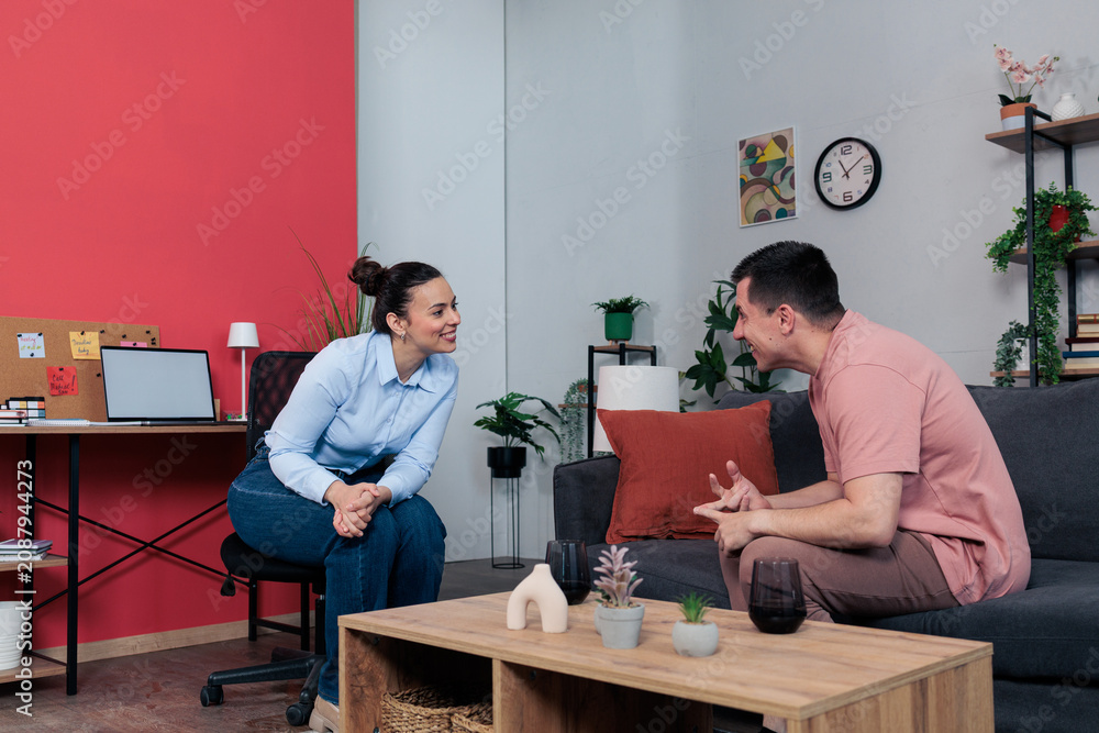 Fototapeta premium Woman therapist counseling man patient during session
