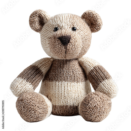 Cute hand-knitted beige teddy bear toy sitting on white background isolated