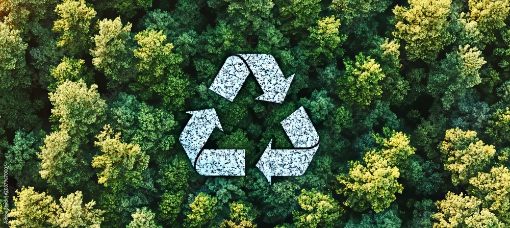 Obraz premium Aerial View of Lush Green Forest with Recycling Symbol Representing Environmental Responsibility