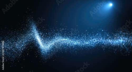 Flowing wave of blue particles across a dark background with light