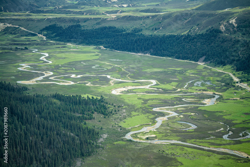 Aerial Panorama of Meandering Rivers and Wetlands on Genyen South Route
