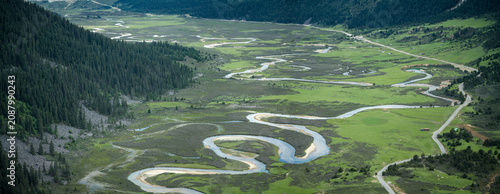 Aerial Panorama of Meandering Rivers and Wetlands on Genyen South Route