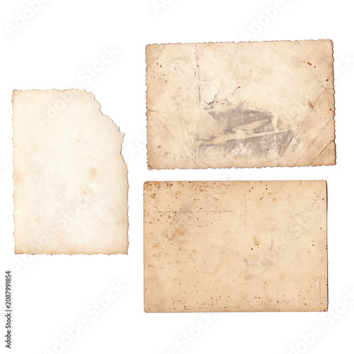 Vintage old photos back texture with visible stains, aged yellowed details. Retro brown photo frames isolated on white abckground