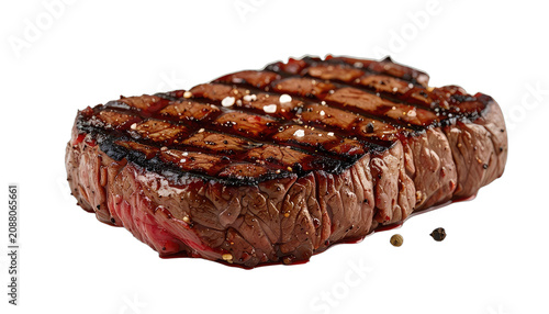 A perfectly grilled steak seasoned with salt and pepper.