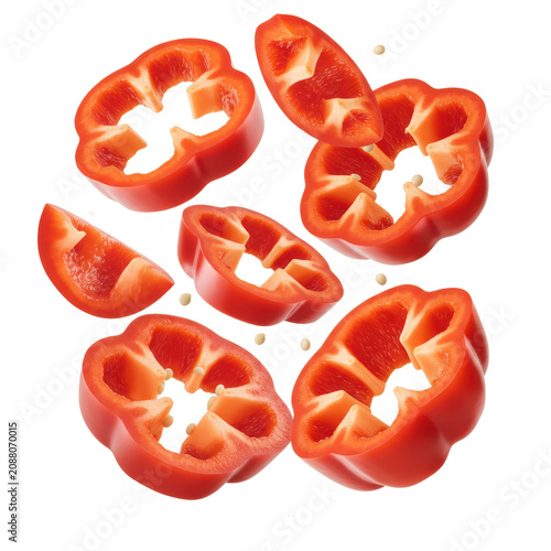 Vibrant red bell pepper slices, crisp, translucent, delicate seeds visible, suspended mid-air against immaculate white background with copy space, concept of healthy food