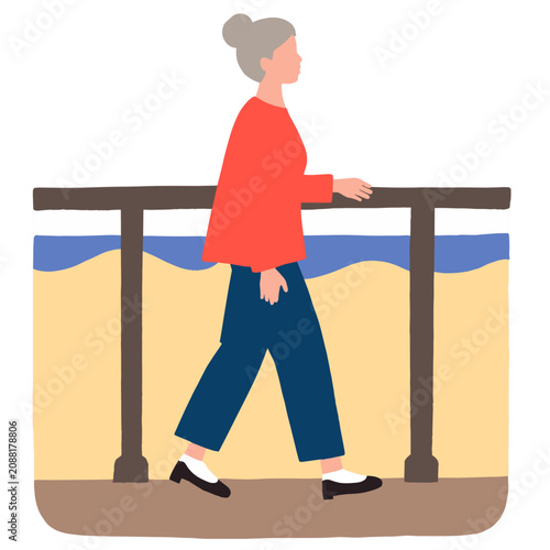 Elderly woman walking along a beach path with blue ocean background. Elderly set  