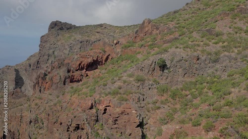 Panning over Teno mountain cliffs and caves