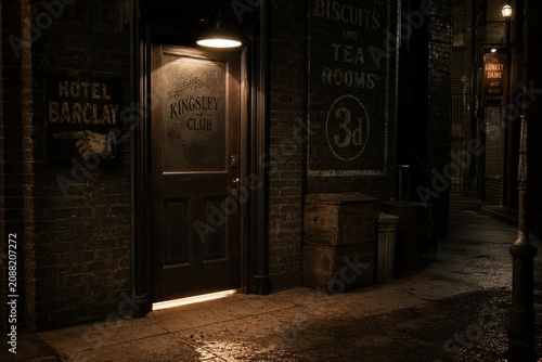 Bild auf Leinwand Hidden entrance to a speakeasy, warm light and jazz music under the door