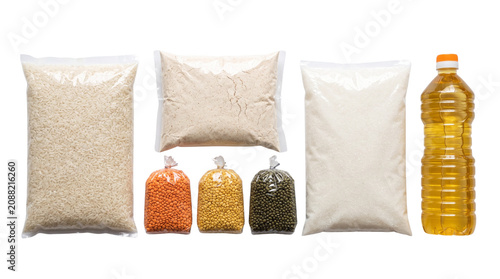 Essential food donation kit with bags of rice, flour, lentils and cooking oil, emergency grocery supplies for humanitarian aid and charity isolated PNG with Transparent Background