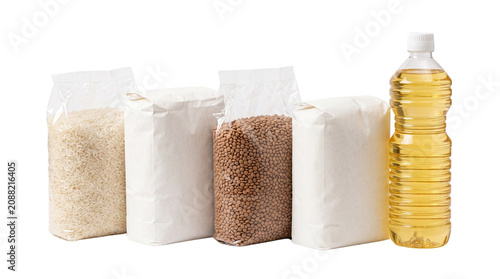 Essential food supplies and dry grocery staples, assorted bags of rice and grains with cooking oil, pantry donation items for humanitarian aid isolated PNG with Transparent Background