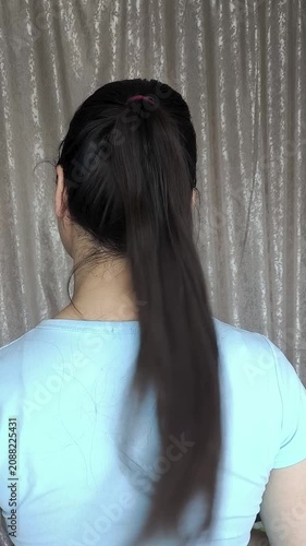 ponytail hairstyle, long brown hair, beauty routine and personal care concept.
