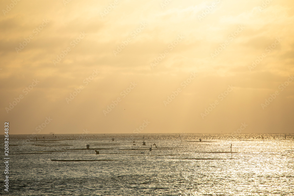 Obraz premium Sunset by the sea in Anping, Tainan, Taiwan
