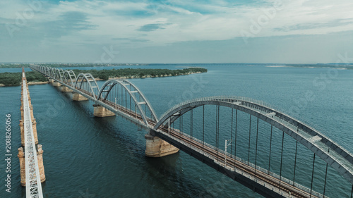 Canvas Print Long Arc Bridge connecting across water on river godavari in Rajahmundry India