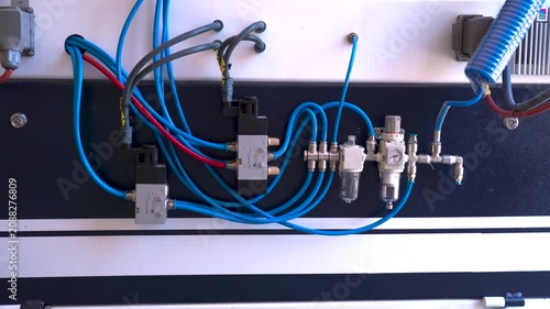 Industrial pneumatic system with solenoid valves and compressed air manifold