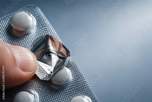 Eye Reflection in Blister Pack Medication Macro