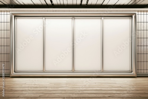 Empty illuminated display panels framed by wood floor and tiled wall