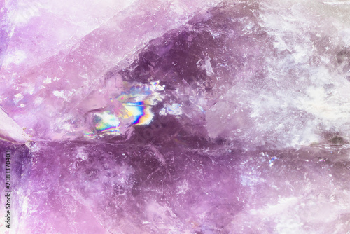 surface of raw natural amethyst crystal close-up