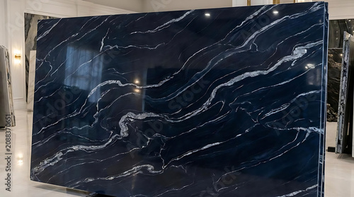 Dark marble slab with white veining polished surface for interior design