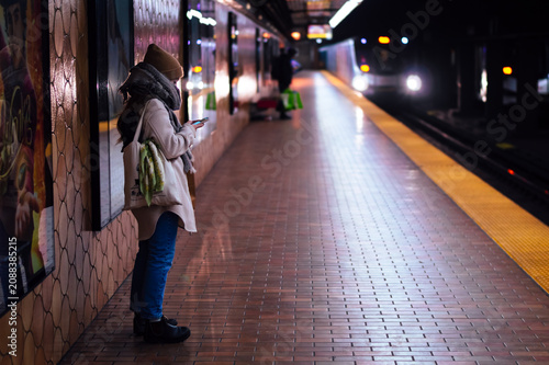 Photography Someone waiting for the train on a cold winters night