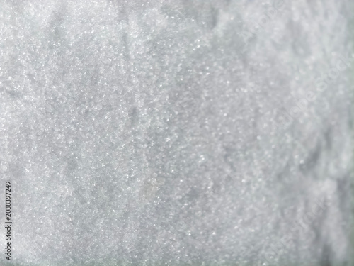 Photography Snow surface glistening with light creating texture
