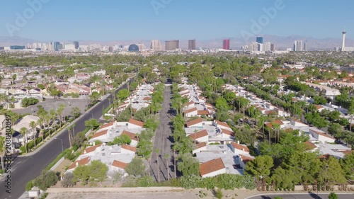 Las Vegas Neighborhood Lateral Aerial with Strip Skyline and Mountain View 02