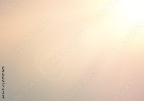 Bright sun flare overlay texture from top right corner for photo editing and pastel graphic design backdrop