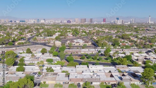 Las Vegas Neighborhood Lateral Aerial with Strip Skyline and Mountain View 04