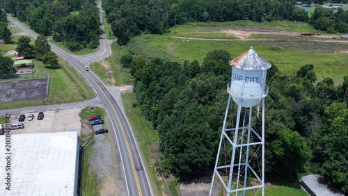Aerial view of Historic water tower Star City, Arkansas with rural countryside