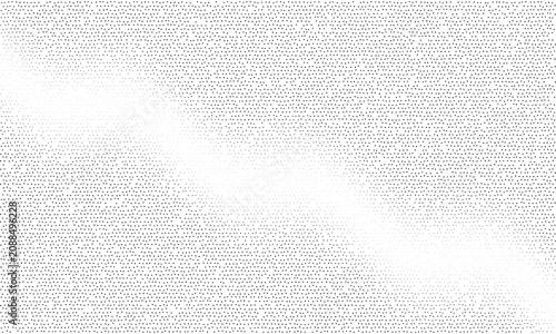 Photos Close-up of countless tiny black text characters forming a diagonal gradient on